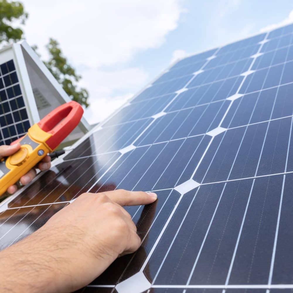 Engineer with energy measurement tool photovoltaic modules for renewable energy